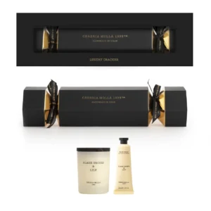Cracker de Navidad Cerería Mollá en caja negra con vela mini y crema de manos Black Orchid & Lily