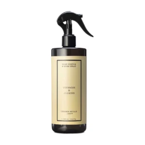 Spray textil Tuberose & Jasmine de Cerería Mollá 500 ml: botella ámbar con etiqueta beige y pulverizador de pistola negro